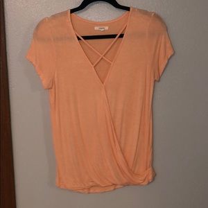 Light orange/pink shirt